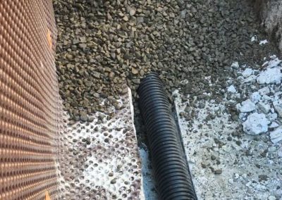 Service de drain français et imperméabilisation de fondations à Longueuil et sur la Rive-Sud et Rive-Nord/ Mini-Excavation Montréal